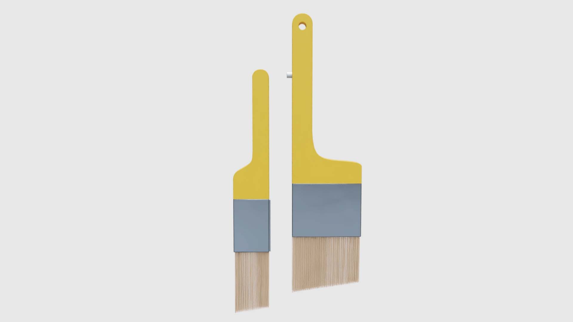 The narrow detail brush and wider coverage brush, with the locking stud that joins them